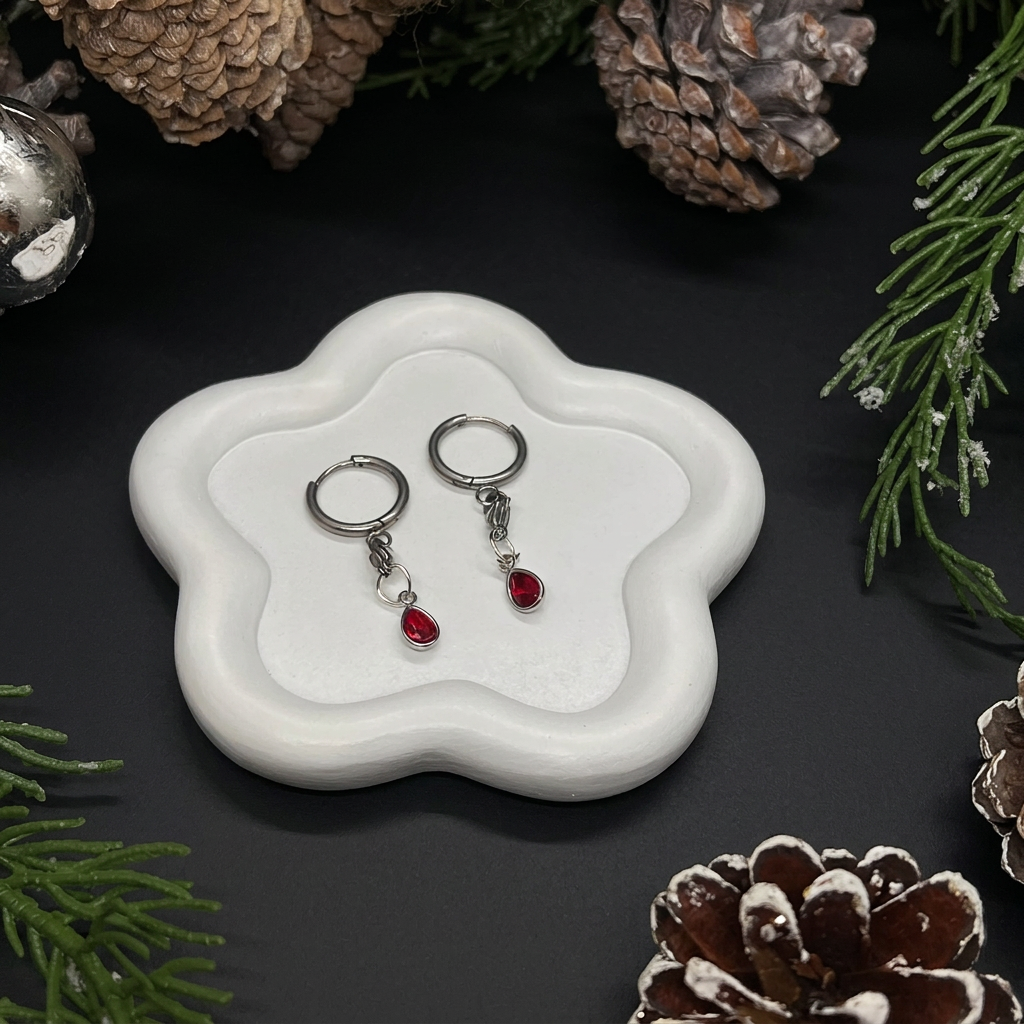 Boucles d’oreilles rouges, vue rapprochée