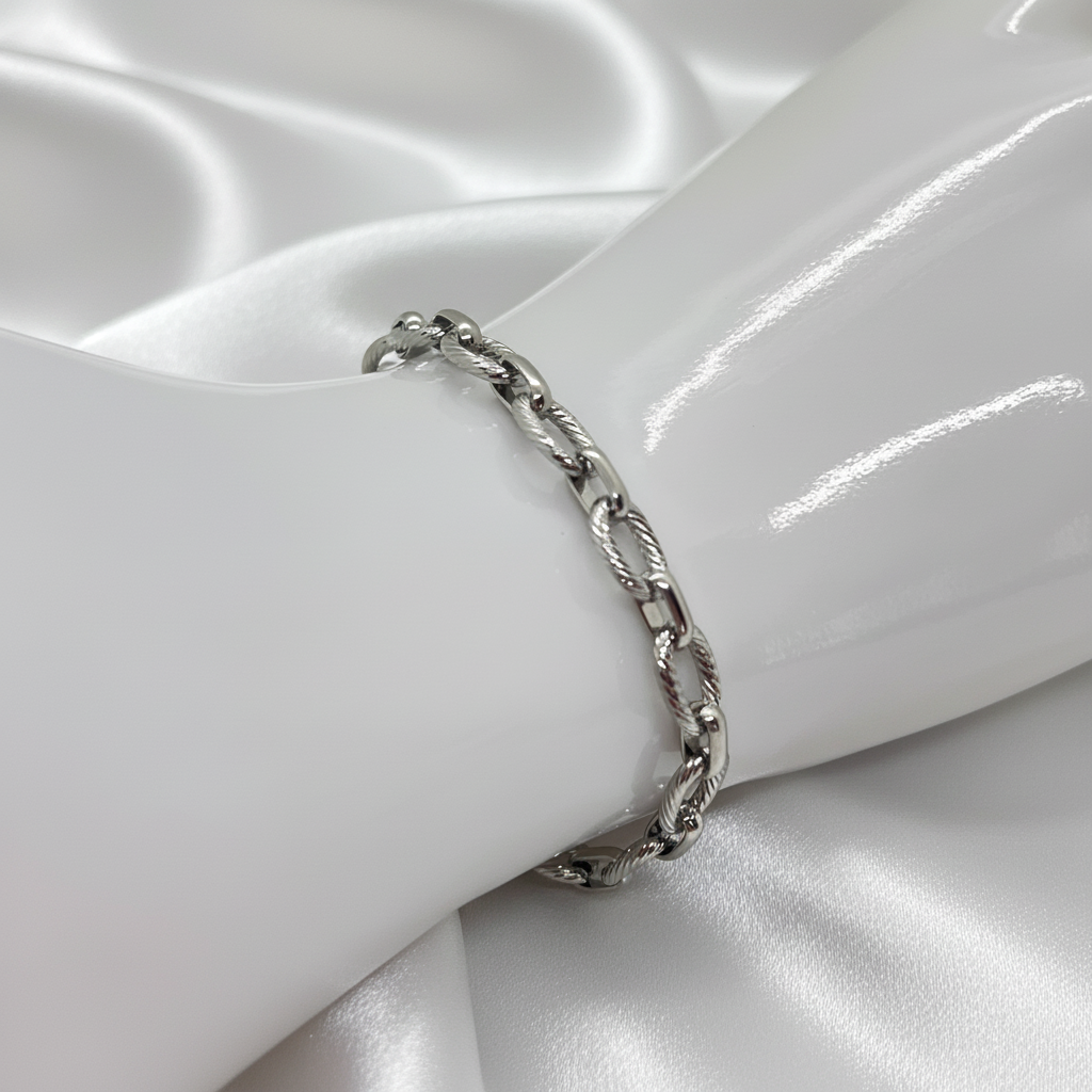 Bracelet torsadé argenté fond soie